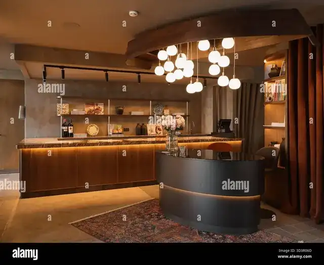 elegant boutique hotel lobby with warm welcoming interior design