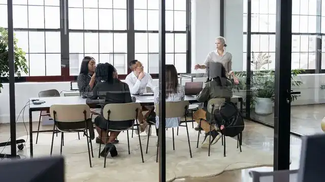 professional accountant reviewing small business finances at a modern office desk
