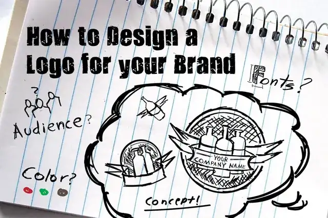 brand designer sketching logo concepts and brand guidelines