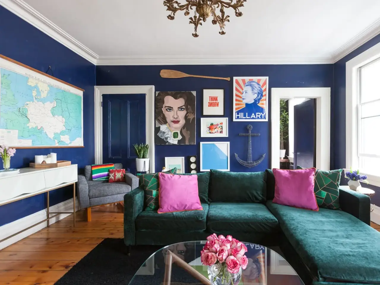 real estate agent showing a bright modern apartment to clients