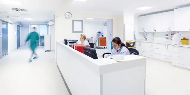 modern medical clinic reception with friendly professional staff