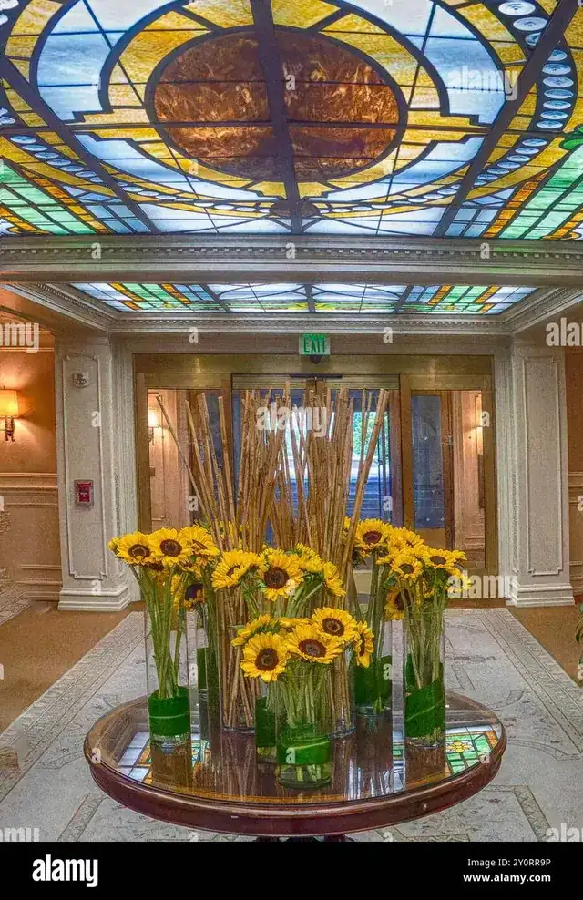 elegant boutique hotel lobby with warm welcoming interior design