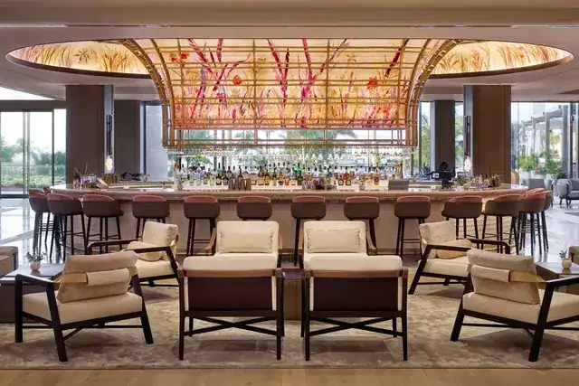 elegant boutique hotel lobby with warm welcoming interior design