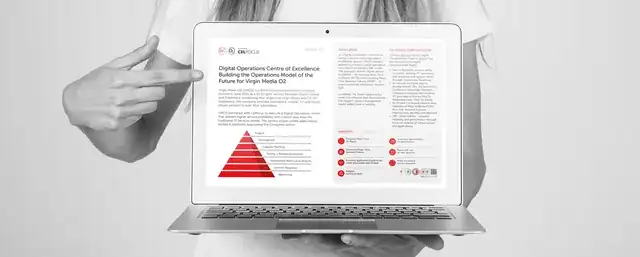 web design agency office with laptop showing a website for businesses in Santander Spain