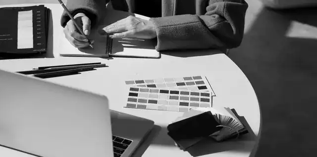 web design agency office with laptop showing a website for businesses in Barcelona Spain