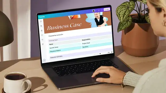 Small business owner planning a website budget with sticky notes on a glass wall